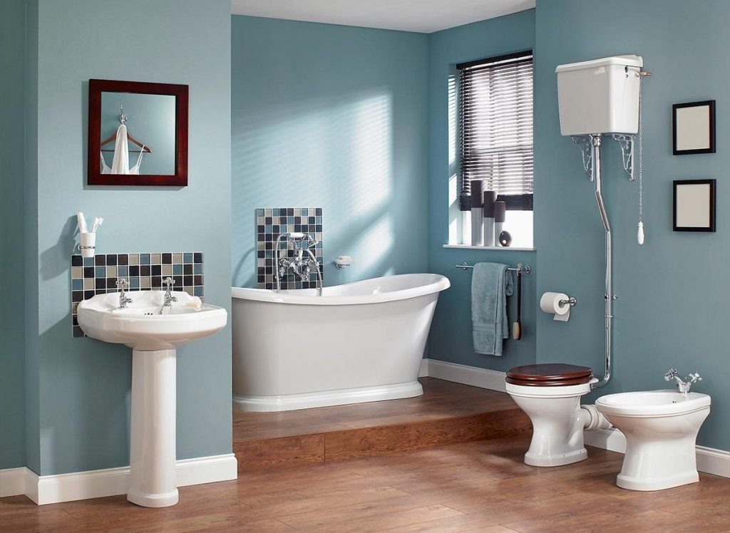 Phòng vệ sinh mát mẻ với màu xanh pastel.
