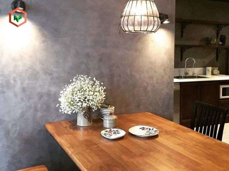 Tường hiệu ứng bê tông đem đến không gian phòng ăn ấm cúng